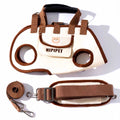 A versatile HIPIPET pet carrier designed for small dogs and cats, featuring a crossbody sling style with multiple carrying options — hand-held, shoulder-strapped, or worn across the body. The beige canvas body includes a front pocket with a cute bear logo for storing treats or essentials, while the included adjustable harness and leash ensure secure attachment during transit. Ideal for vet visits, park outings, or travel, this lightweight bag prioritizes comfort and convenience for both pet and owner.