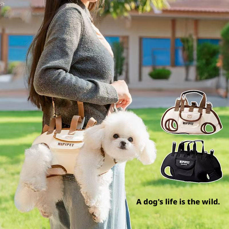 A versatile HIPIPET pet carrier designed for small dogs and cats, featuring multiple carrying options — hand-held, shoulder-strapped, or worn across the body. The beige canvas body with brown trim includes a front pocket with brand logo for storing treats or essentials, while the included adjustable harness and leash ensure secure attachment during transit. Ideal for vet visits, park outings, or travel, this lightweight bag prioritizes comfort and safety.