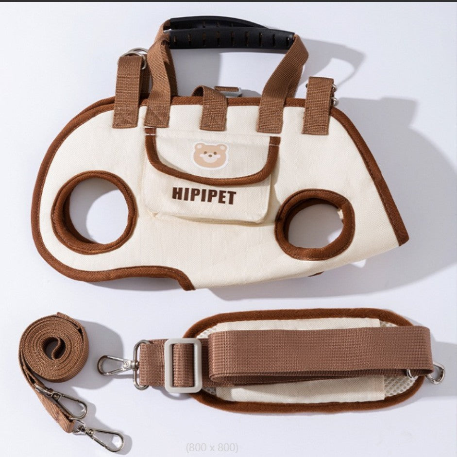 Concise Description: The HIPIPET beige portable pet carrier features a cute bear logo and brand emblem on the front. It supports hand-carry, crossbody, and shoulder wear. Equipped with an adjustable leash and a wide shoulder strap, it is suitable for the daily outings or short trips of small dogs and cats, ensuring both safety and comfort.